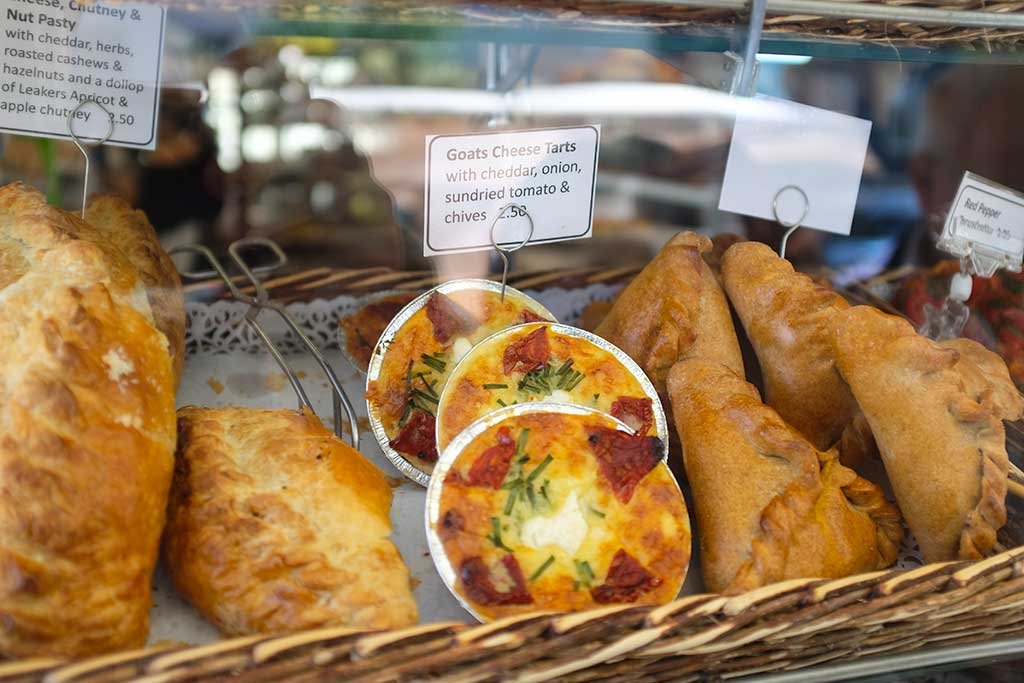 Looking in a bakers window in East Street