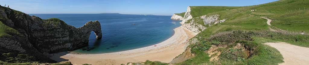Another panoramic view of the beach with the chalky cliffs of Bat's Head in the distance
