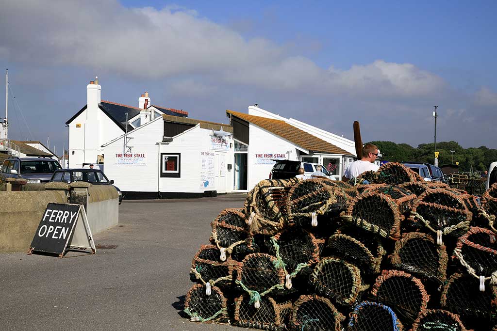 Photo of the lobster pots outside the Fish Stall on Mudeford Quay